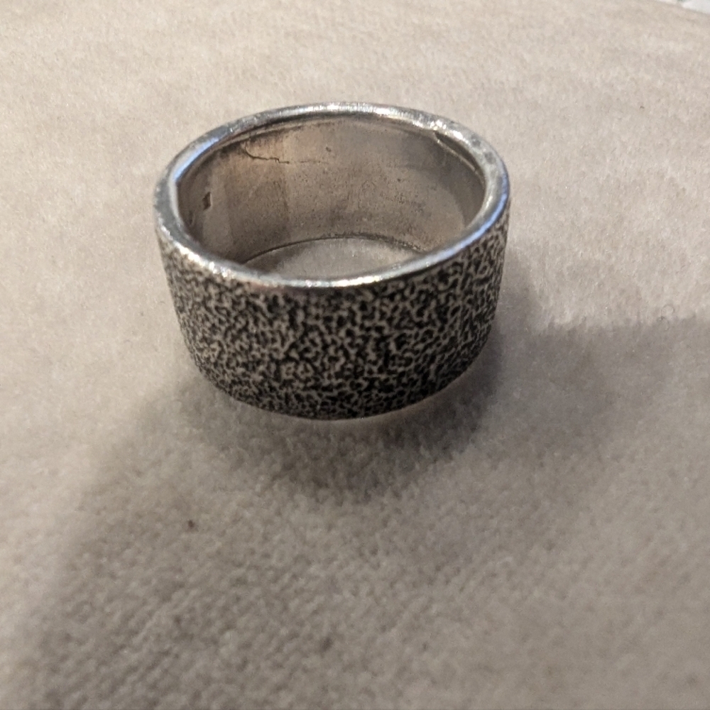 Hammered sterling silver ring handcrafted in Italy. Size 6, 10 mm wide 7 grams